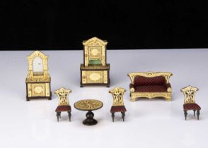 A rare German chromolithograph paper on wood dolls’ house ivory and ebony saloon set,