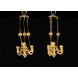 A rare pair of German gilt metal dolls’ house chandeliers,