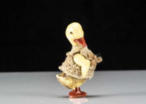 A Hertwig all-bisque dolls’ house duckling boy doll,