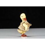 A Hertwig all-bisque dolls’ house duckling boy doll,