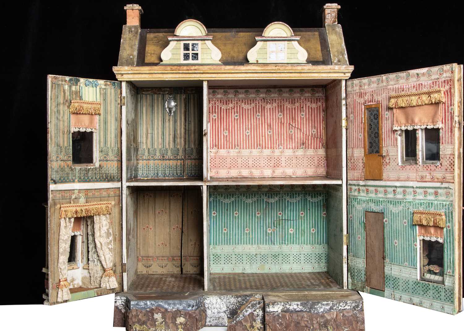 A Gottschalk wooden dolls’ house raised on a bark base, - Image 2 of 2