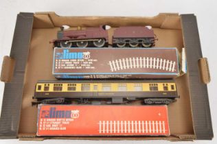 Lima 0 Gauge 2-Rail Locomotive and Coach and oval of track (5, including tender),