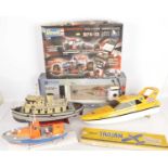 Radio Controlled Boat and Helicopter with various Accessories and Revell car kits and Balsa Airplane