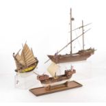 Five kit/scarcity ships from various periods one in a damaged display case (4),