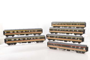 Modified Lima 0 Gauge coaches in BR Inter-City Swallow livery