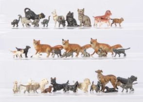 A selection of metal cats and dogs by various makers including Crescent toys and Pixyland comprising
