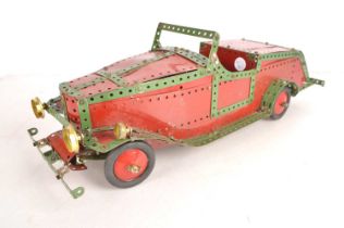 A large scale 2-Seater Roadster made from red and green Meccano,