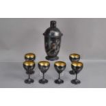 A Chinese lacquer Art Deco era cocktail set with a cocktail shaker and six matching goblets,
