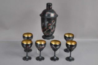 A Chinese lacquer Art Deco era cocktail set with a cocktail shaker and six matching goblets,