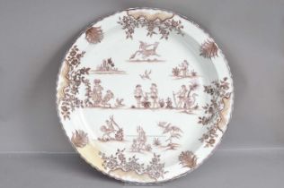 A very large French faience charger in the Moustiers 18th Century style,