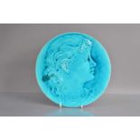 A Burmantofts art pottery turquoise glazed earthenware pottery relief portrait wall plaque,