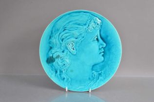 A Burmantofts art pottery turquoise glazed earthenware pottery relief portrait wall plaque,