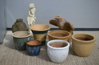 A group of glazed terracotta garden pot and various ornaments,