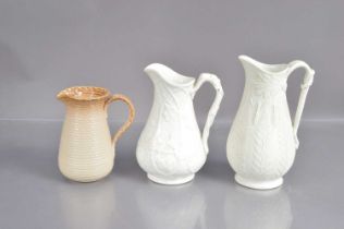 Three pottery jugs including a Victorian 'William Brownfield' fern pattern example,
