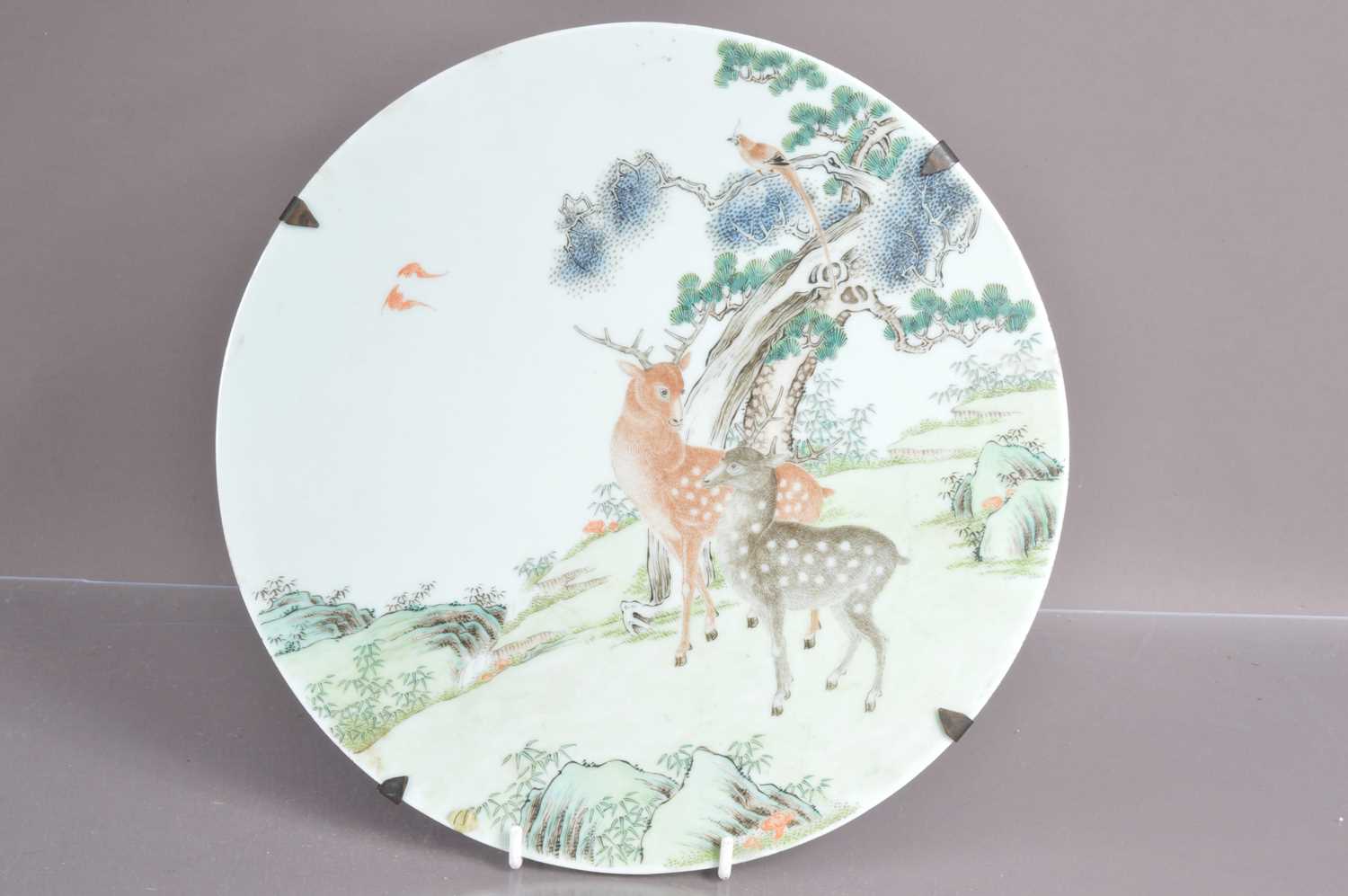 A Chinese Qing dynasty famille rose porcelain wall plaque,