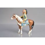 Beswick figure of a native American chief riding a skewbald horse,
