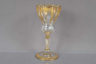 An exceptional Venetian gilt and enamel quatrefoil glass wine goblet by Salviati,