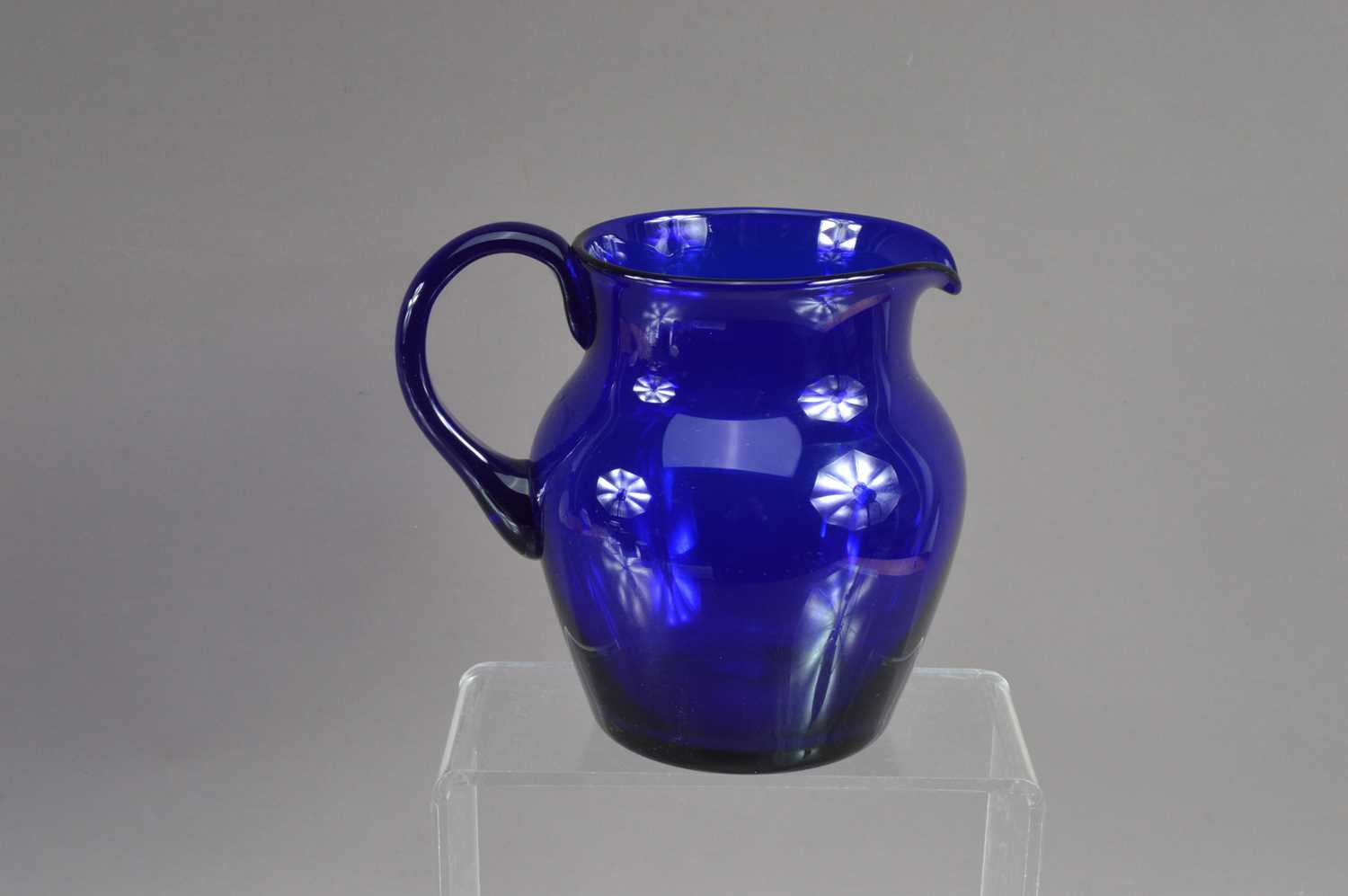 A good antique 19th Century hand-blown 'Bristol Blue' glass jug,