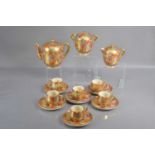 A late Japanese Meiji period Satsuma porcelain coffee set,