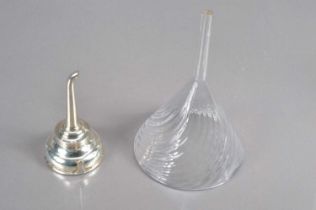 A 19th Century silver plate wine funnel and a larger writhen glass example,