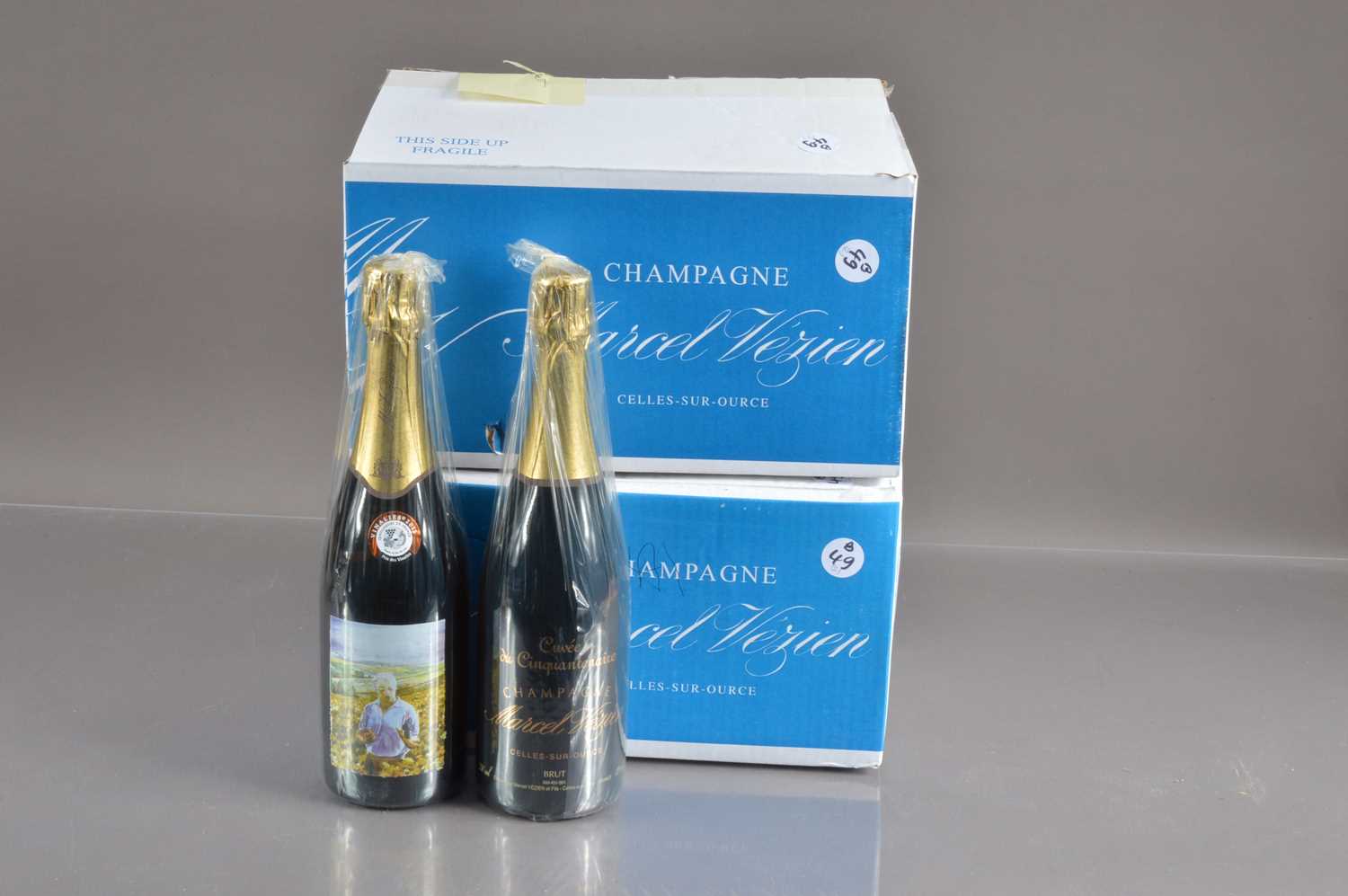 Twelve bottles of Armand Vezien Cuvee du Cinquantenaire Champagne,