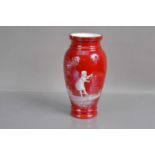 A cased ruby red on white glass 'Mary Gregory' vase,