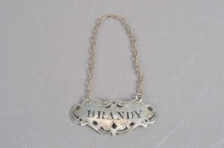 A Victorian silver 'Brandy' decanter label Nathaniel Mills,