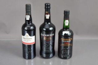 Three bottles of Port including a 1 litre bottle of Cockburn's 'Special Reserve',