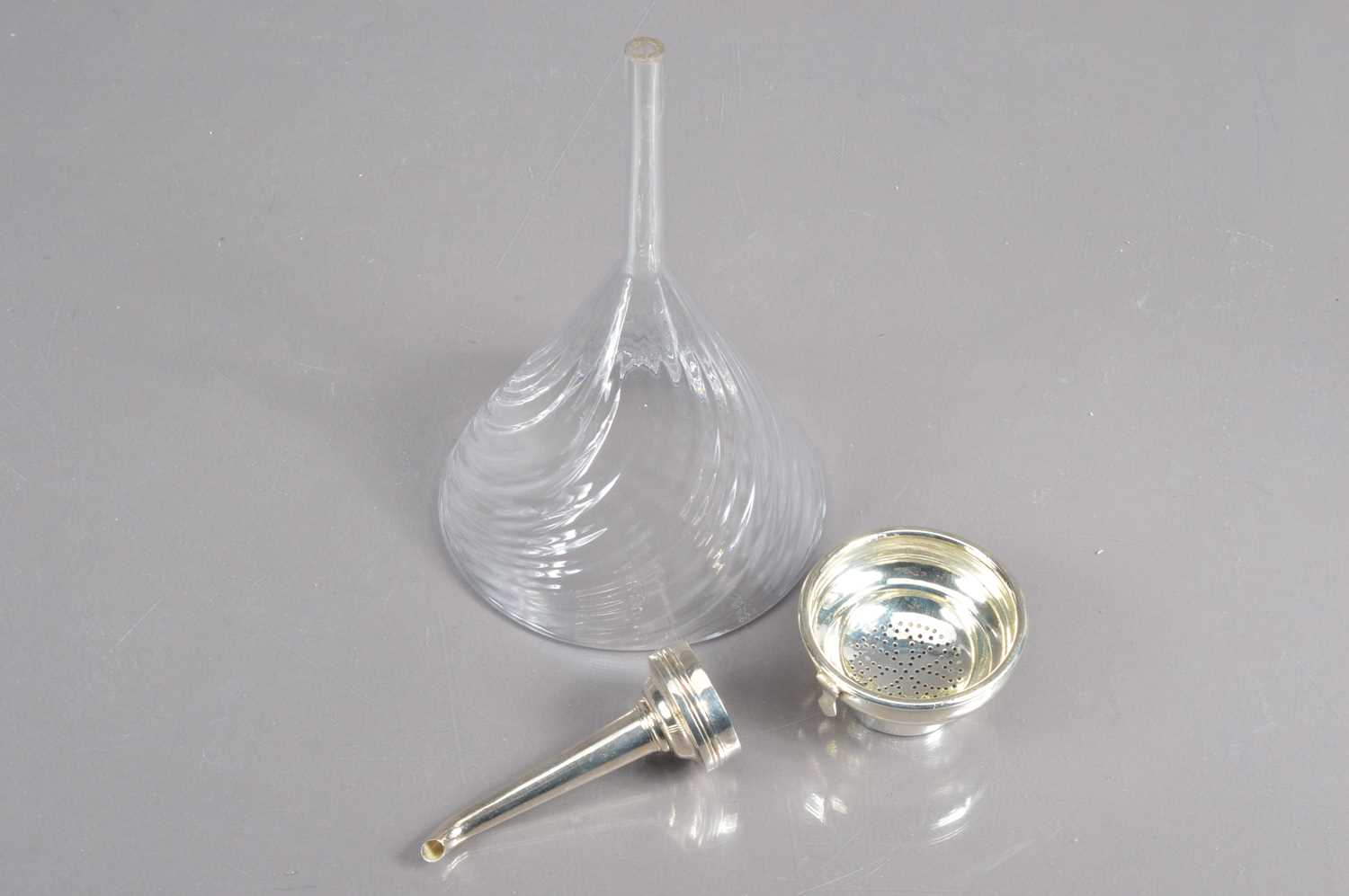 A 19th Century silver plate wine funnel and a larger writhen glass example, - Image 3 of 3