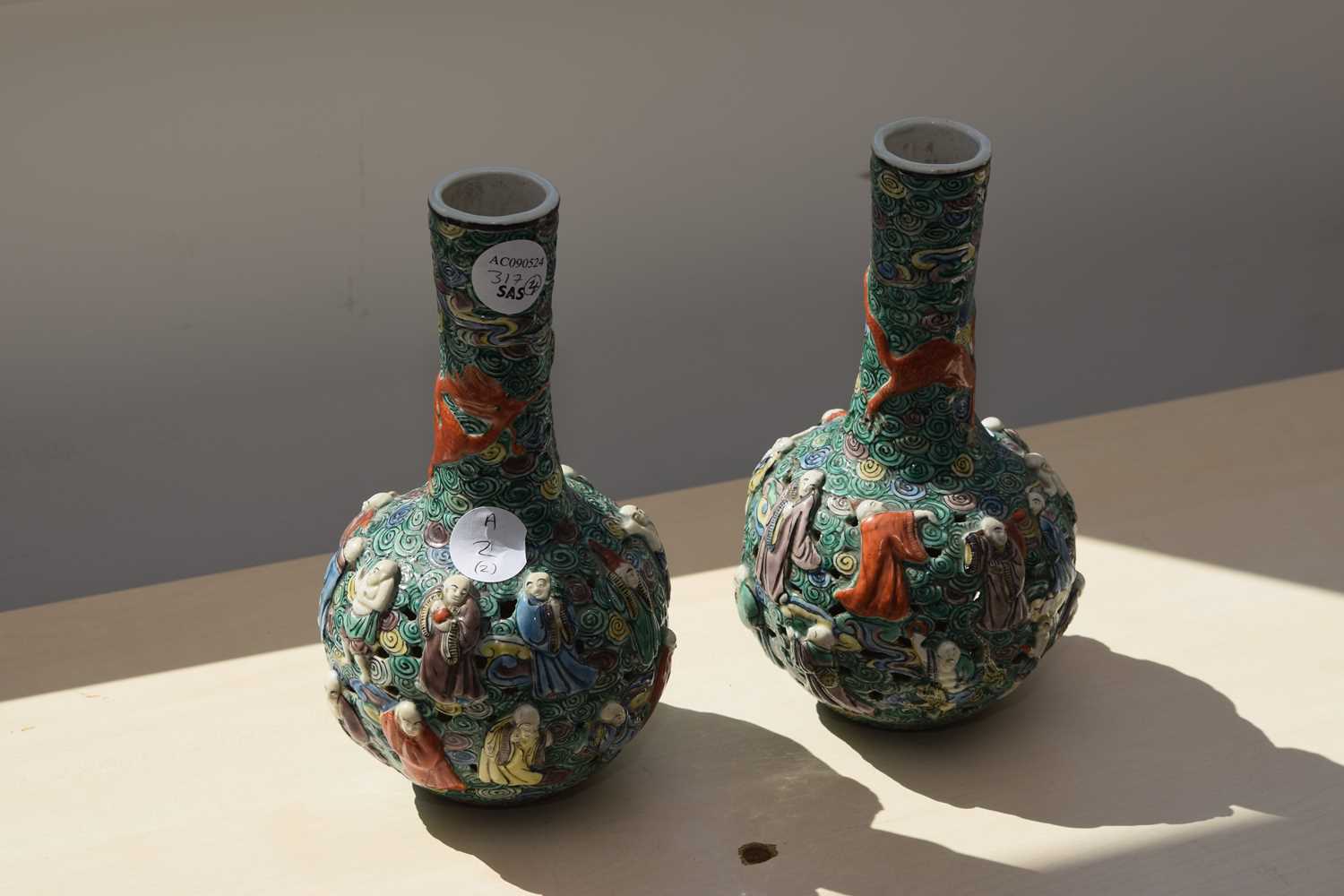 A pair of 19th Century Chinese famille verte relief moulded and reticulated porcelain bottle vases, - Image 11 of 15