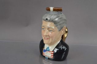 A novelty "LIARBILLYTEA" ("Bill Clinton") teapot designed by Vince McDonald for 'Totally Teapots'