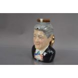 A novelty "LIARBILLYTEA" ("Bill Clinton") teapot designed by Vince McDonald for 'Totally Teapots'