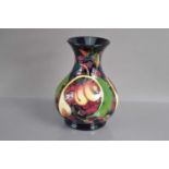 A Moorcroft Pottery "Queen's Choice" vase dated 2000,