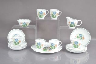 A Susie Cooper bone china teaset in "Blue Gentian" pattern,