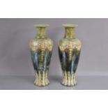 A pair of Royal Doulton Lambethware green glazed Art Nouveau stoneware vases circa 1900,