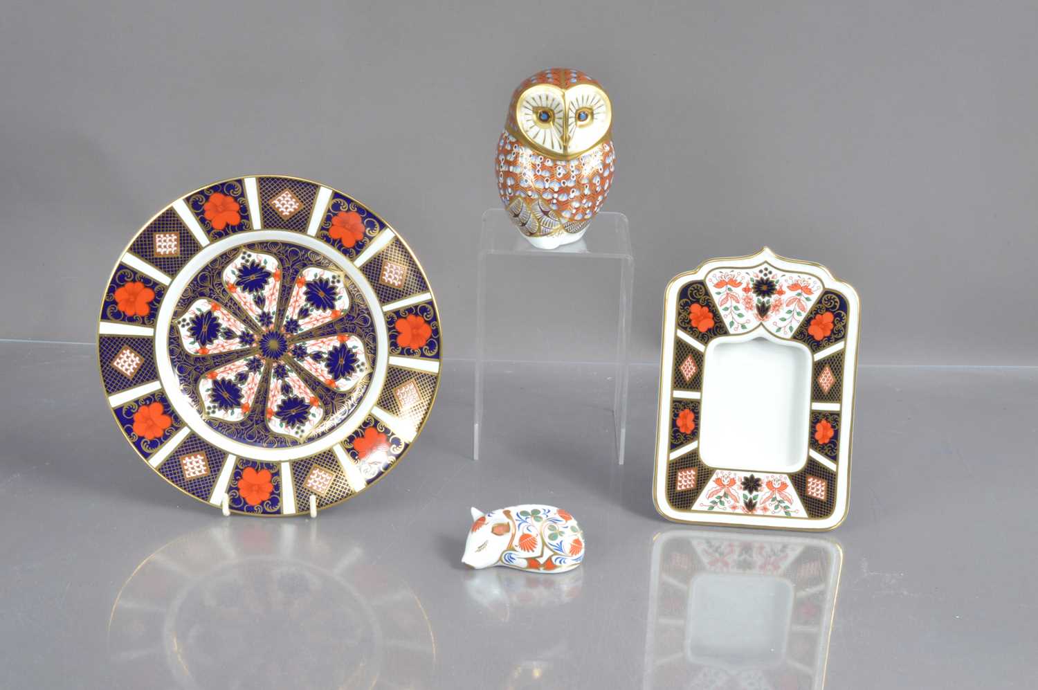 A Royal Crown Derby porcelain owl and other pieces,
