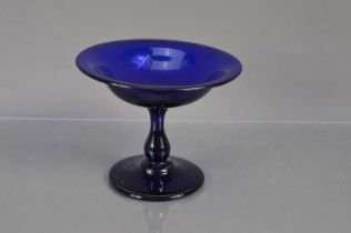 A small "Bristol Blue" glass tazza or shallow footed bowl,