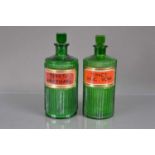 Two early 20th Century green glass apothecary's or chemist's bottles,