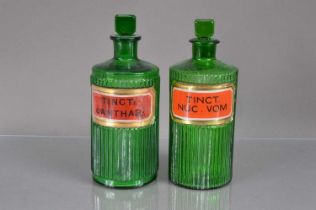 Two early 20th Century green glass apothecary's or chemist's bottles,
