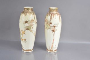 A pair of art nouveau style Japanese Meiji period Satsuma earthenware vases,