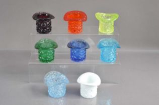 A good collection of eight Fenton pressed glass "daisy button" top hat posy vases,