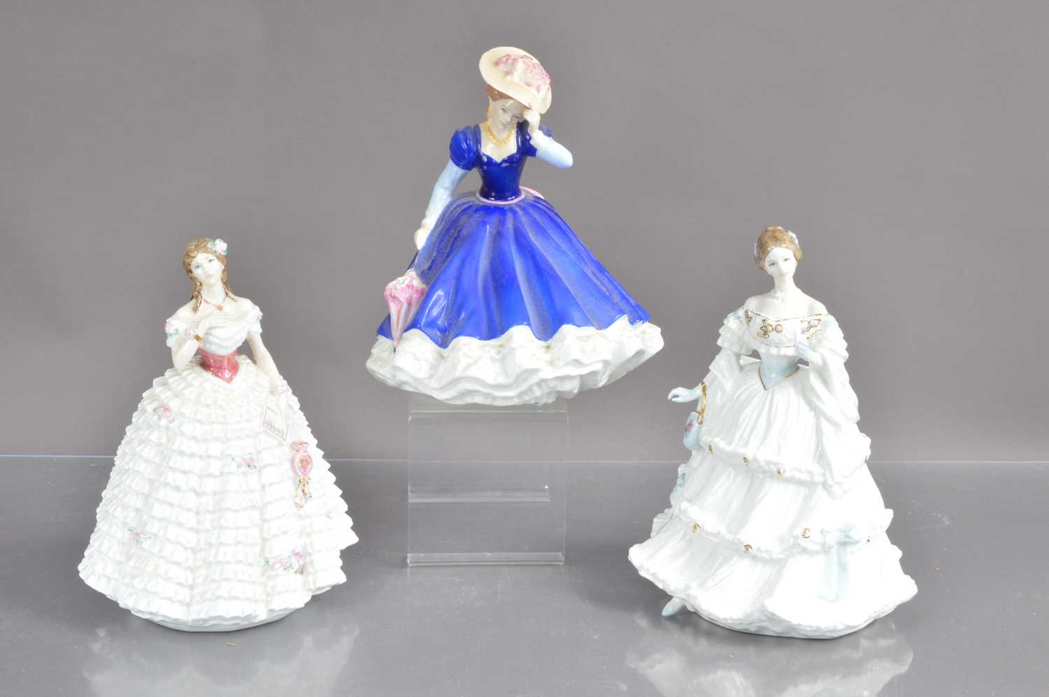 Three Royal Doulton limited edition porcelain figurines,