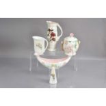 A group of Maling cream and lustre glazed Art Deco period items,