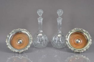 A pair of Victorian Elkington & Co silver plated magnum bottle coasters,