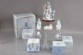 A group of six Lladro Christmas related items including 'The Snow Man' 05713,