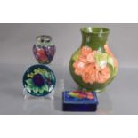 Four good examples of Moorcroft Pottery,