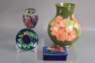 Four good examples of Moorcroft Pottery,