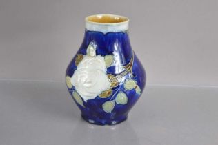 A Royal Doulton Art Nouveau vase decorated with white roses circa 1900,
