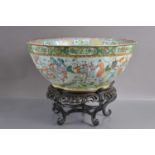 A very large 19th Century Cantonese famille rose punch or fish bowl,