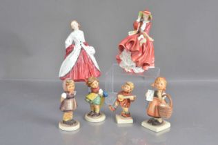 A pair of Royal Doulton figurines and four Goebel Hummel figures,